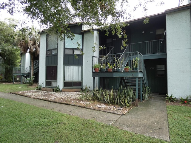 4340 Lakeway Dr Unit H, Orlando, FL 32839 - view of property featuring stairs