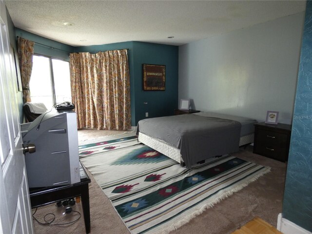 4340 Lakeway Dr Unit H, Orlando, FL 32839 - bedroom with a textured ceiling