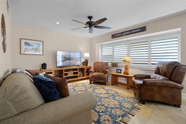 living area with recessed lighting, ceiling fan, and light tile patterned floors