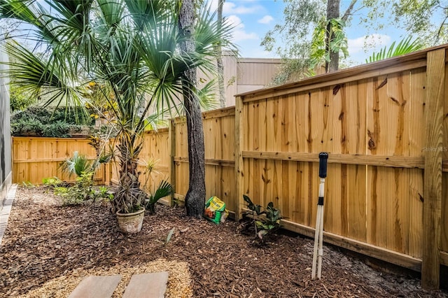 view of yard with a fenced backyard