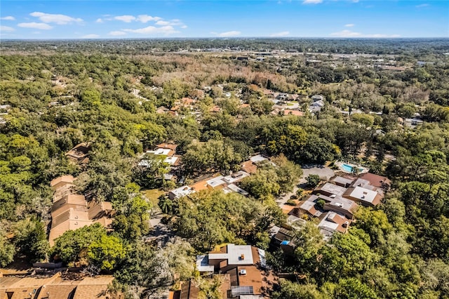 bird's eye view with a forest view and a residential view