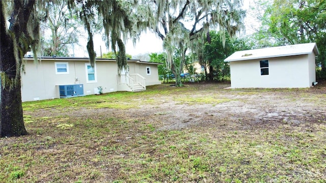 view of yard with central AC