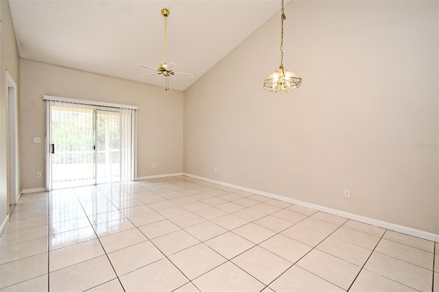 unfurnished room featuring ceiling fan, light tile patterned floors, vaulted ceiling, and baseboards