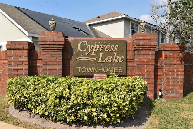 view of community sign