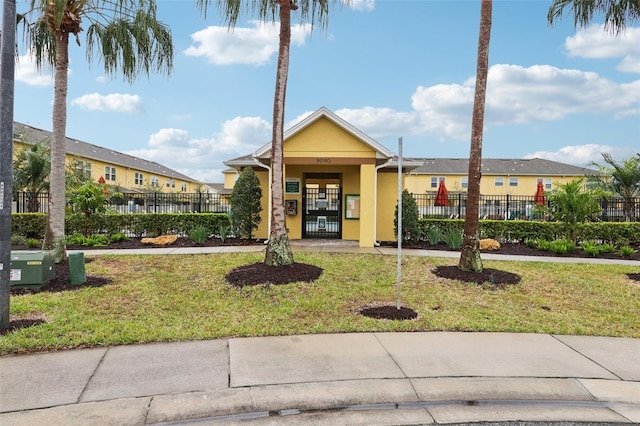 view of property with a fenced front yard