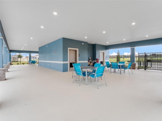 dining space featuring recessed lighting