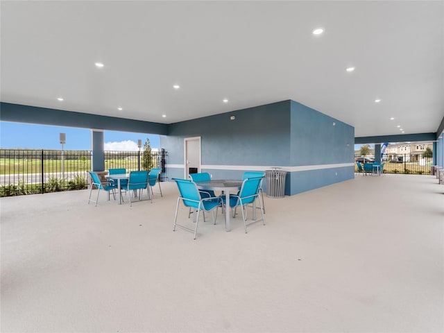 view of patio / terrace featuring fence and outdoor dining area