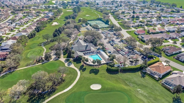 drone / aerial view featuring a residential view and view of golf course