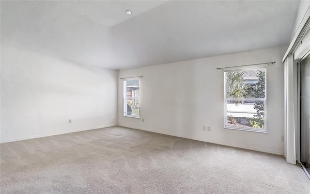 7233 SE 171st Pond Ln, The Villages, FL 32162 - spare room featuring healthy amount of natural light and light colored carpet