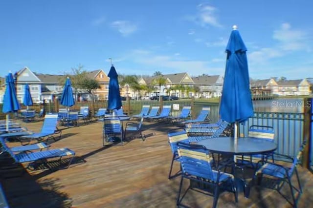 wooden deck featuring a residential view