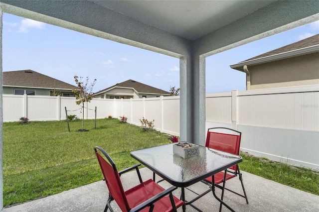 view of patio / terrace with outdoor dining area and a fenced backyard