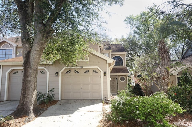 view of front of house featuring concrete driveway