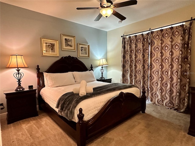 bedroom featuring ceiling fan and carpet flooring