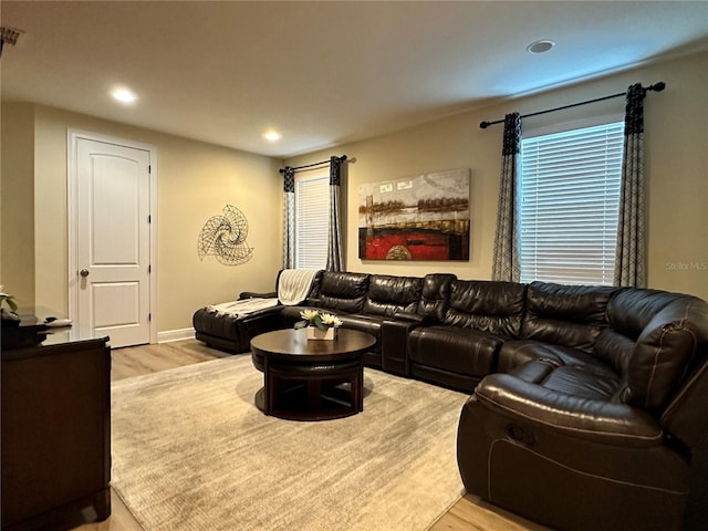 living room featuring wood finished floors and recessed lighting