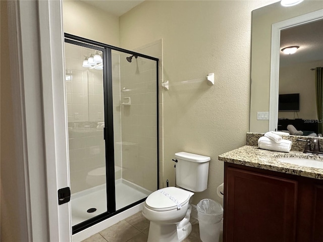 ensuite bathroom with toilet, ensuite bath, tile patterned floors, vanity, and a shower stall