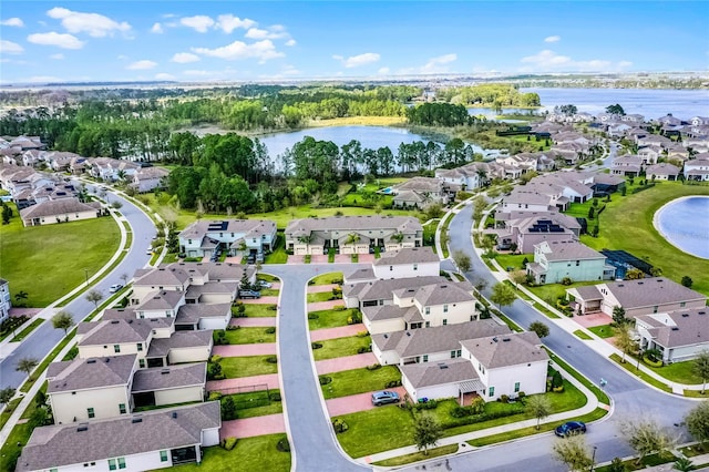 aerial view with a residential view and a water view