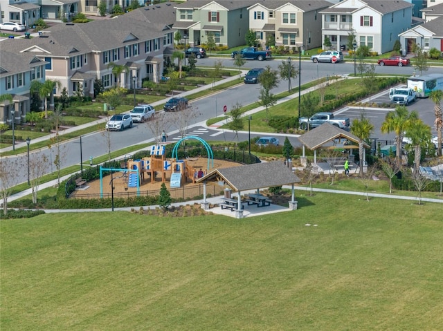 exterior space with a residential view and a yard