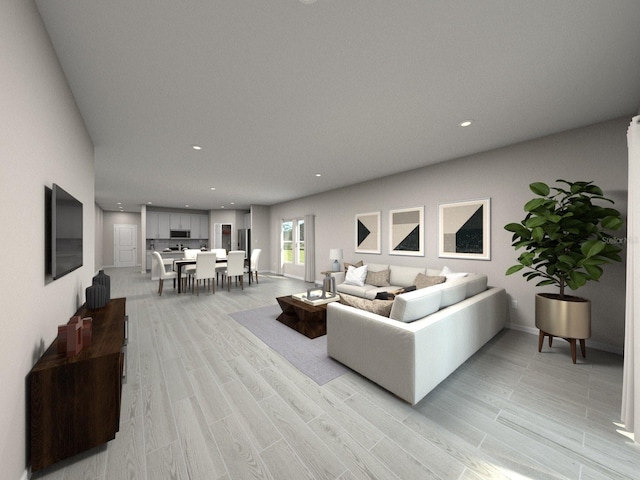 living area featuring light wood-type flooring and recessed lighting