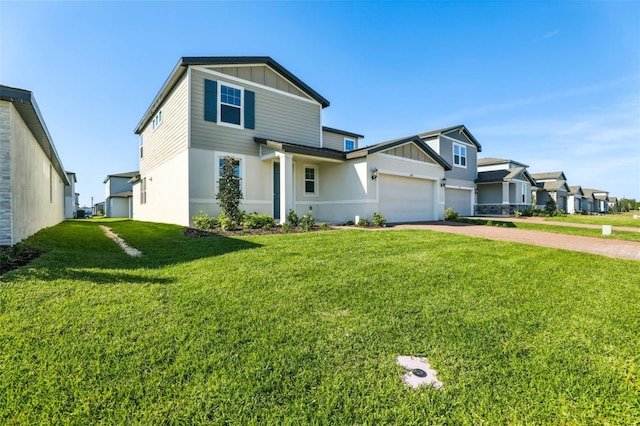 view of front facade featuring driveway, a front yard, a garage, and board and batten siding