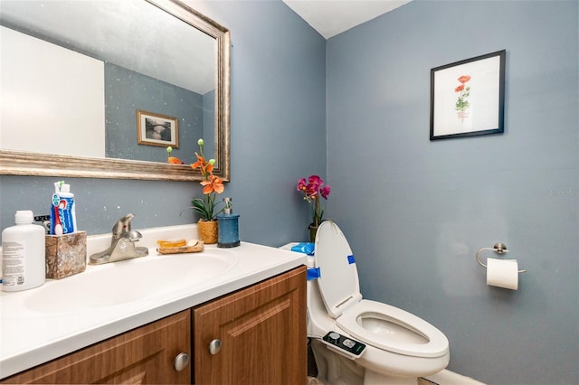 half bath with toilet and vanity