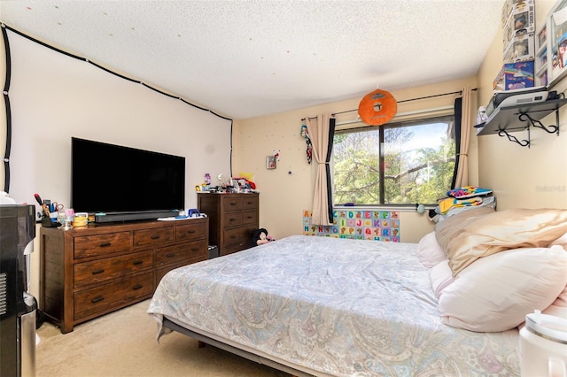 carpeted bedroom featuring a textured ceiling