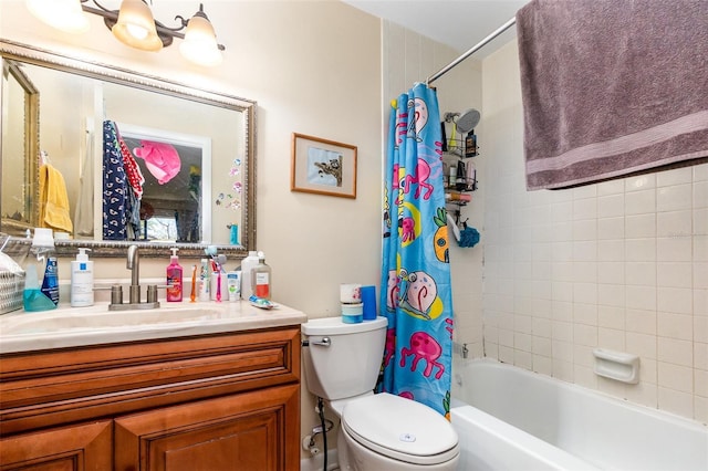 full bathroom featuring shower / tub combo, vanity, and toilet