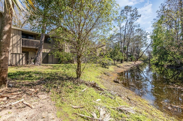 view of yard with a water view