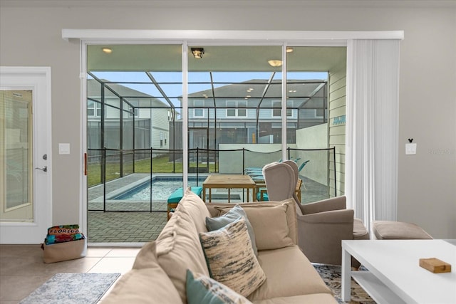 tiled living room featuring a sunroom