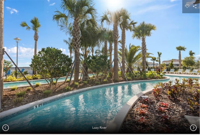 pool featuring fence