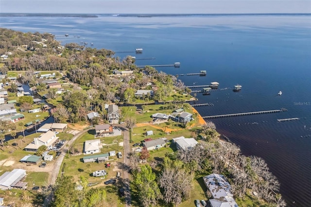 aerial view with a water view and a residential view