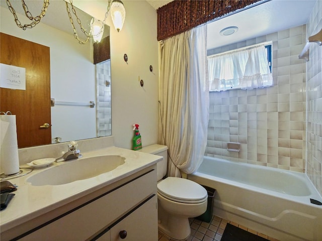 full bath with shower / tub combo, tile patterned flooring, vanity, and toilet