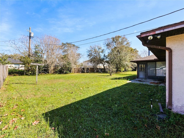 view of yard with fence