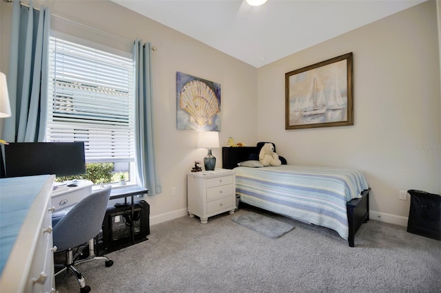 carpeted bedroom with baseboards