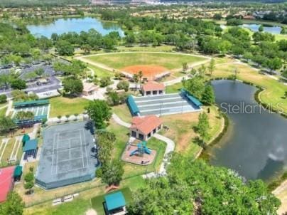 birds eye view of property featuring a water view