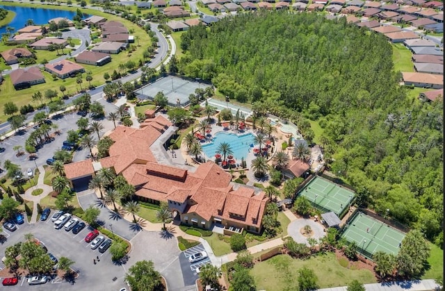 aerial view with a water view and a residential view