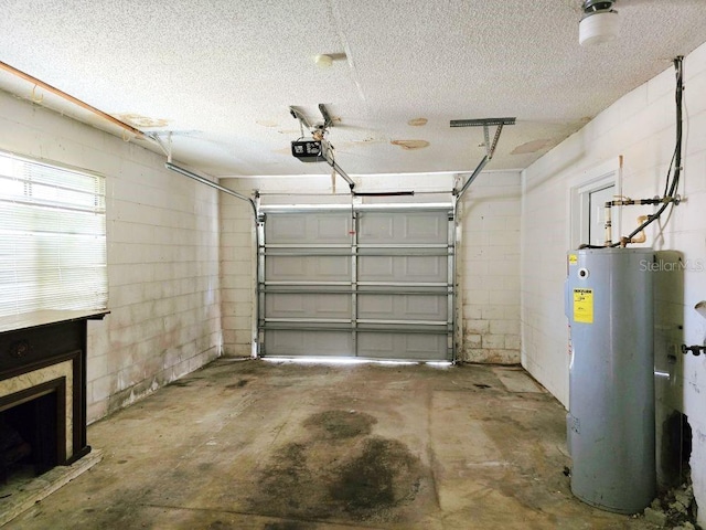 garage with concrete block wall, water heater, and a garage door opener