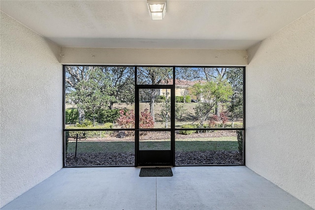 view of unfurnished sunroom