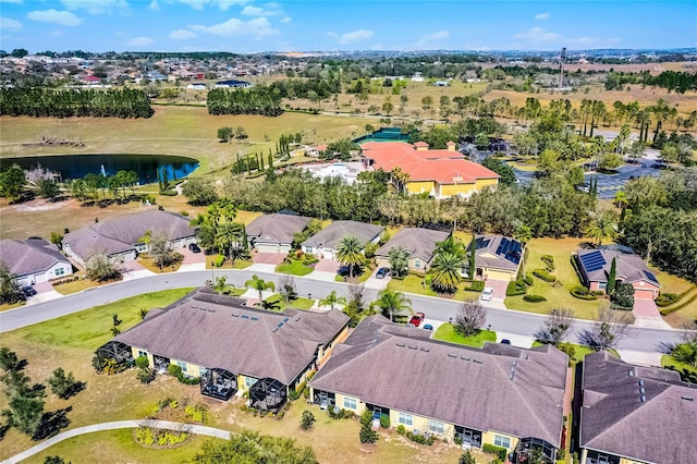 bird's eye view with a water view and a residential view