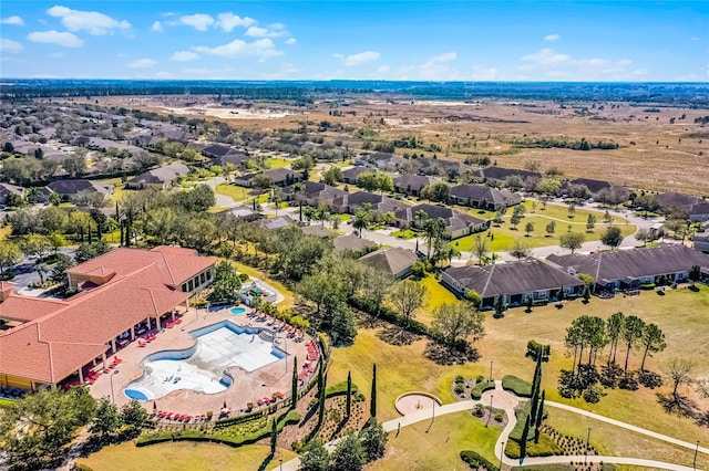 birds eye view of property with a residential view