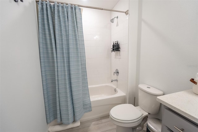 full bath with wood finished floors, vanity, toilet, and shower / bathtub combination with curtain