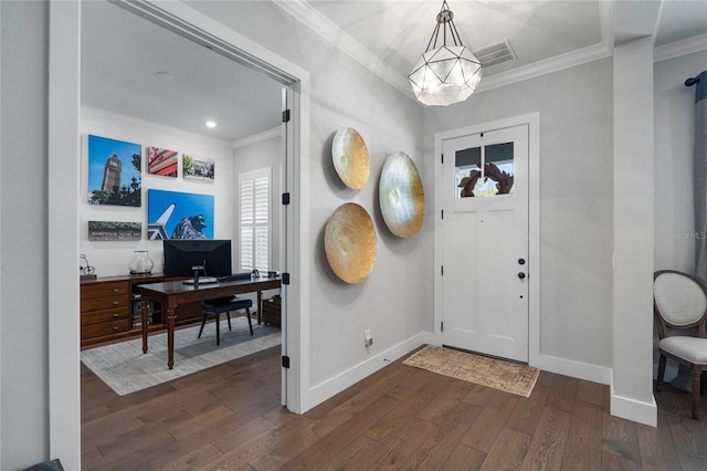 foyer entrance featuring dark wood-style flooring, visible vents, and crown molding