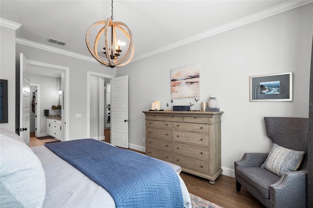 bedroom featuring a notable chandelier, visible vents, ornamental molding, wood finished floors, and baseboards