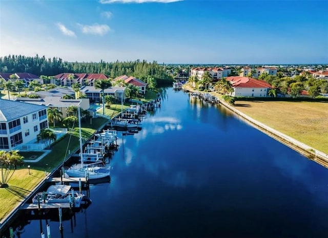 aerial view featuring a residential view and a water view