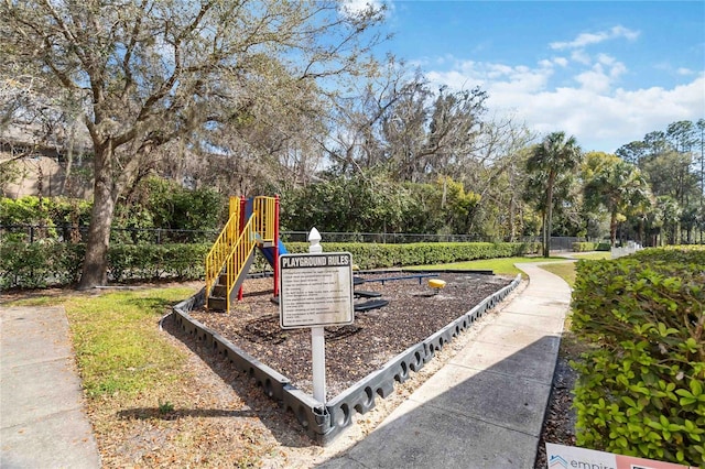 community jungle gym with fence