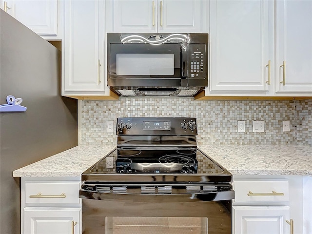 1410 Stockton Dr, Sanford, FL 32771 - kitchen featuring black appliances, light stone counters, backsplash, and white cabinets