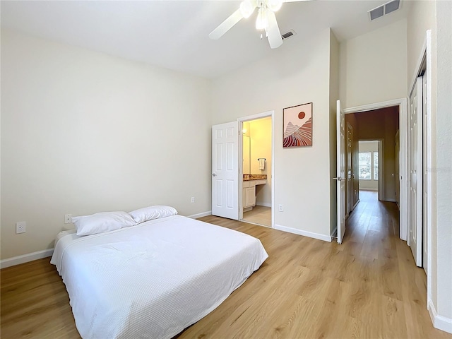 1410 Stockton Dr, Sanford, FL 32771 - bedroom featuring visible vents, light wood-style flooring, and baseboards