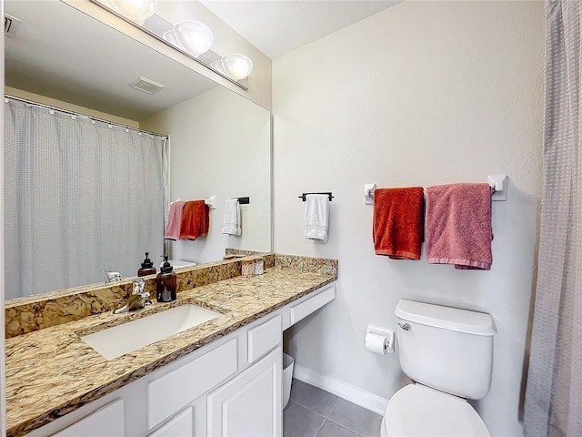 1410 Stockton Dr, Sanford, FL 32771 - bathroom with baseboards, visible vents, toilet, tile patterned floors, and vanity