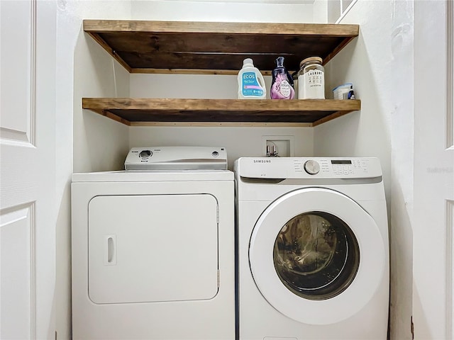 1410 Stockton Dr, Sanford, FL 32771 - laundry room featuring laundry area and washer and clothes dryer