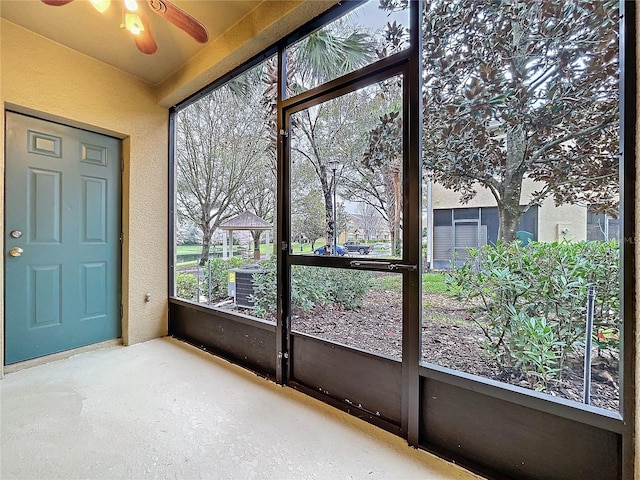1410 Stockton Dr, Sanford, FL 32771 - unfurnished sunroom with a ceiling fan