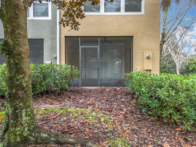 1410 Stockton Dr, Sanford, FL 32771 - view of exterior entry with stucco siding